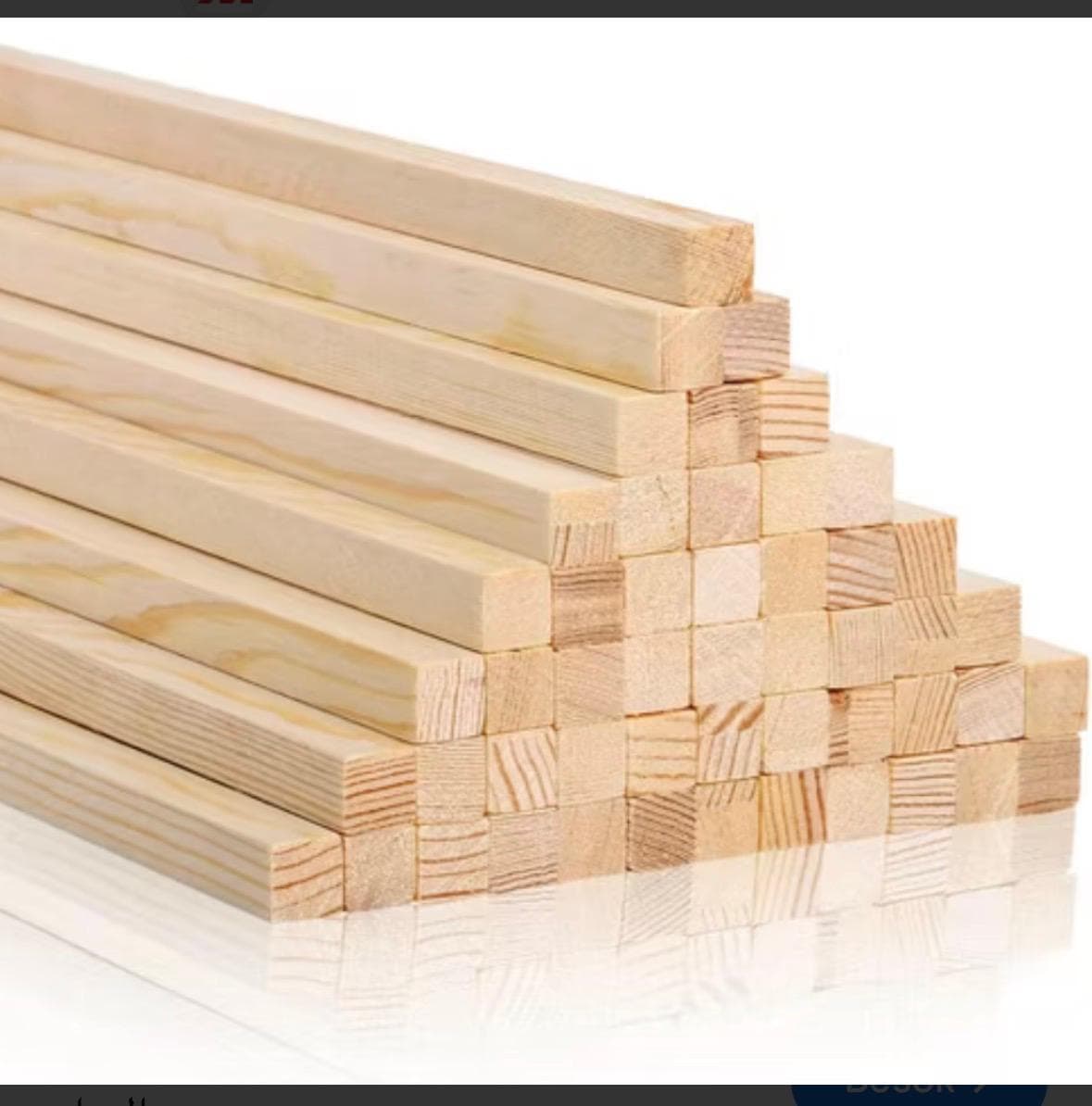 Light white wood boards stacked neatly on a bright clean studio background